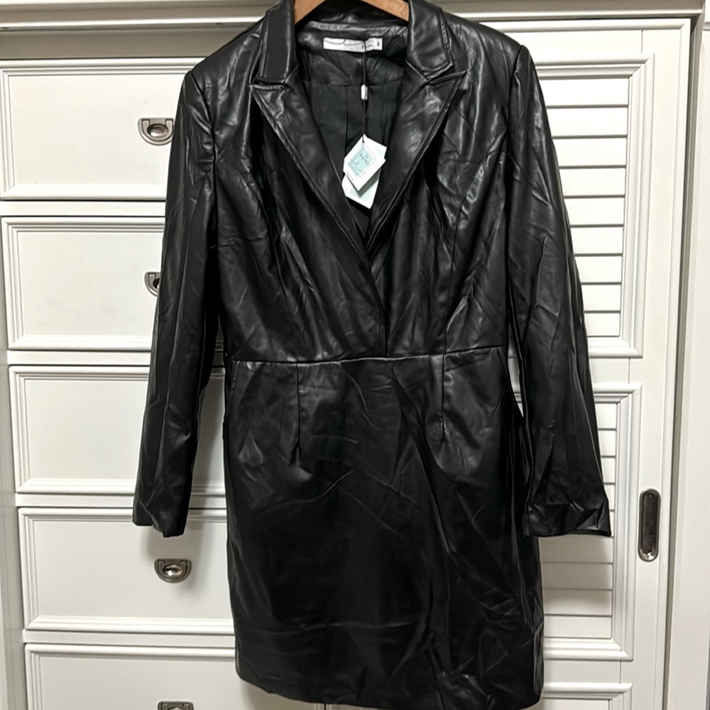 Women’s By Egreis faux leather black dress size medium.
